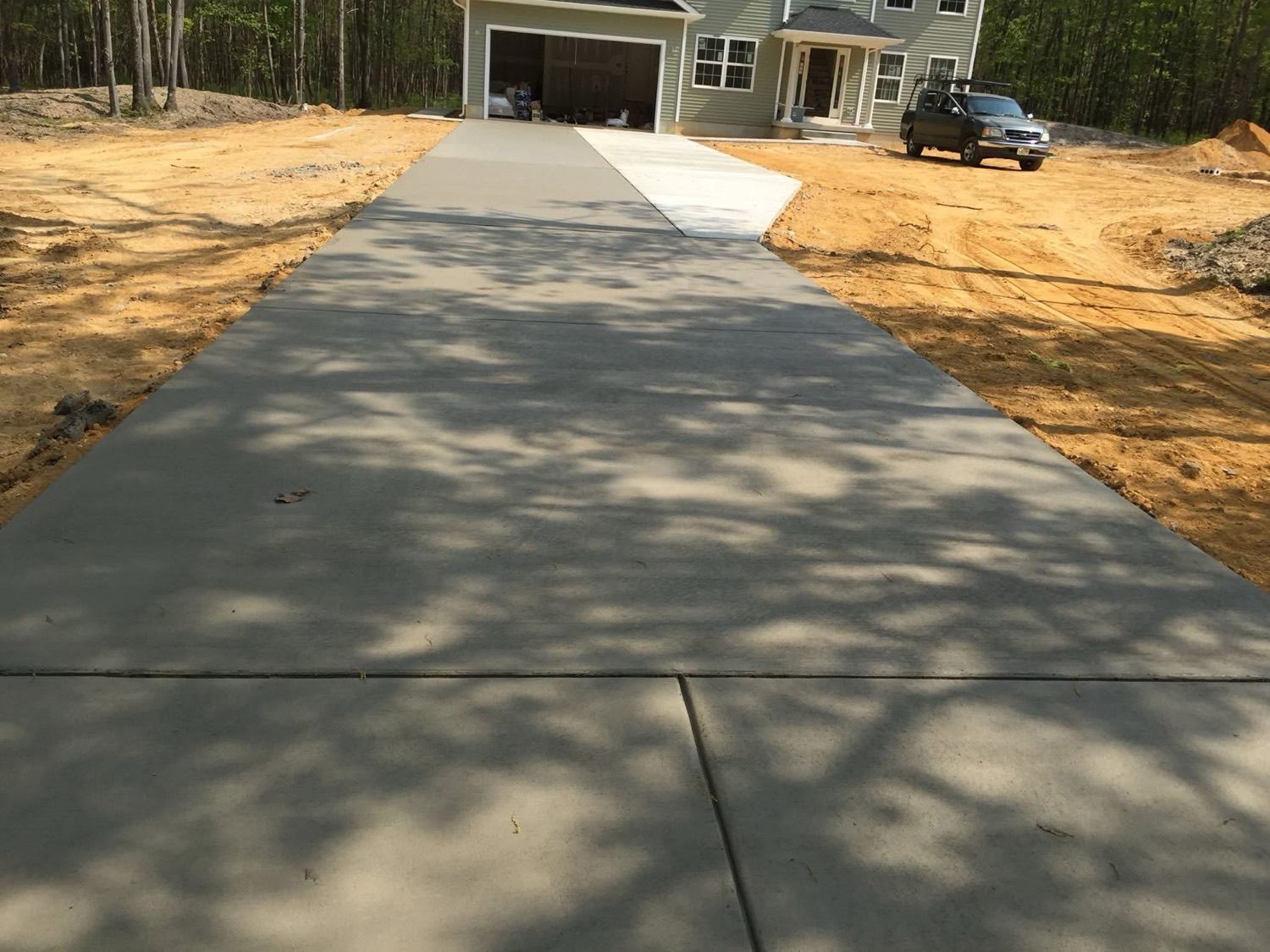 Real Eterno Masonry project — Concrete Driveway
